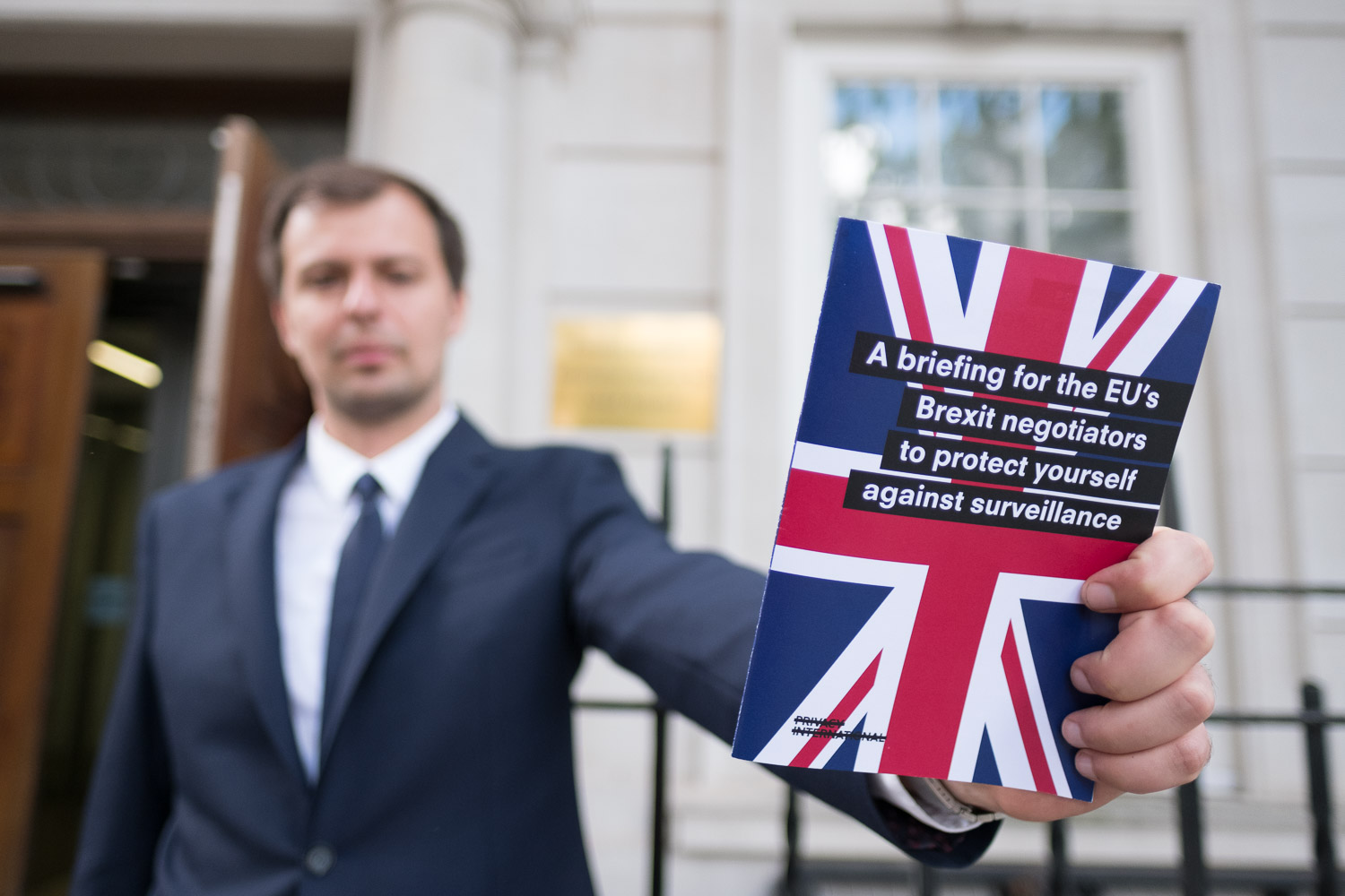 Man holding Brexit leaflet