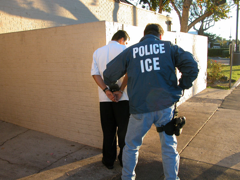 https://commons.wikimedia.org/wiki/File:US_Immigration_and_Customs_Enforcement_arrest.jpg