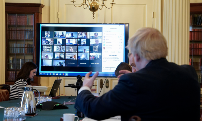  Boris Johnson, UK Prime Minister in front of a screen with Zoom open