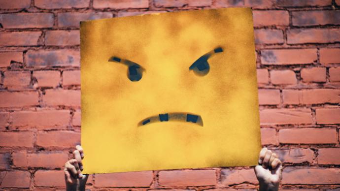Angry paiting on yellow canvas