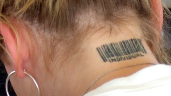 picture of woman with barcode tatoo