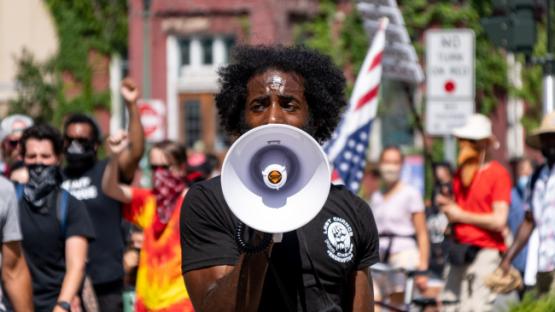 Protestor with microphone in Syracuse October 2020