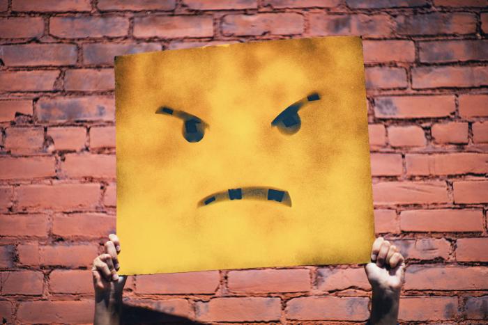 Angry paiting on yellow canvas
