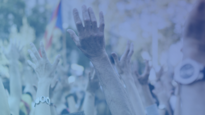 people's hands at protest