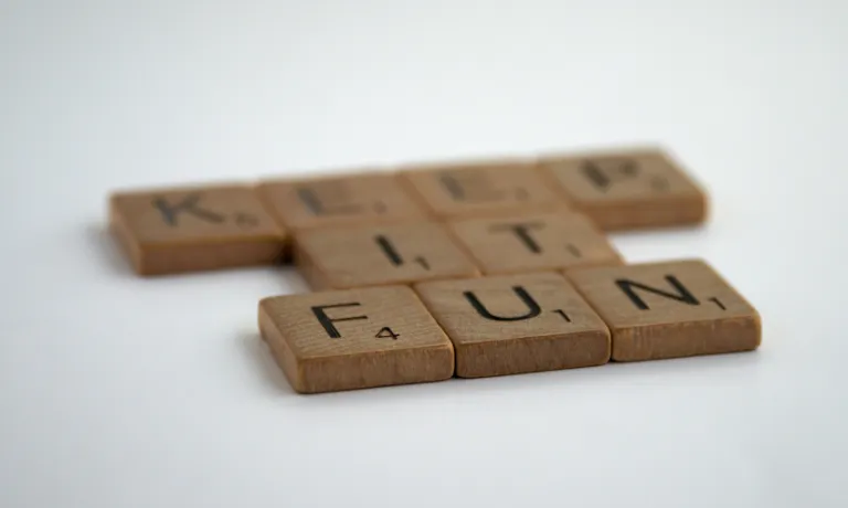 Wooden blocks aligned to spell Keep It Fun