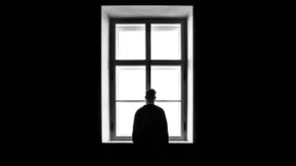 Man staring at the window