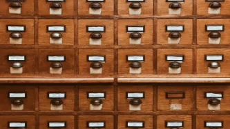 wooden drawers of paper archives